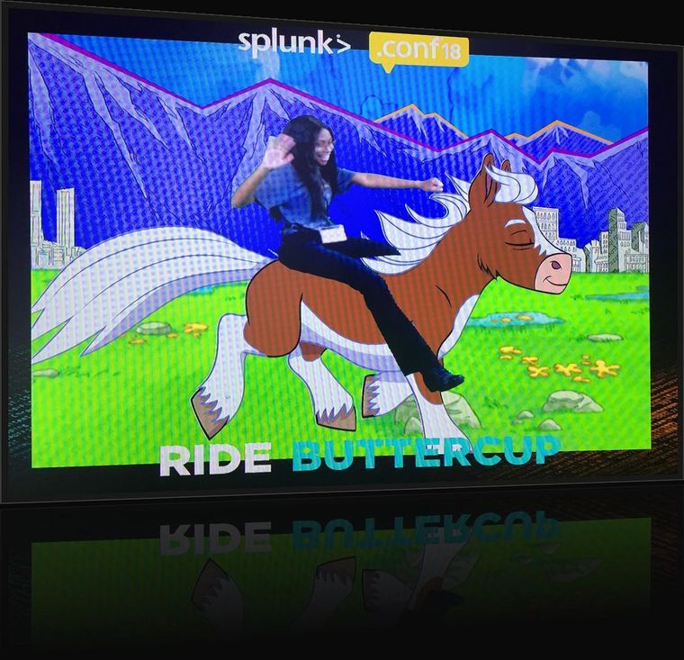 General session keynote screen — a rider on the galloping digital Buttercup