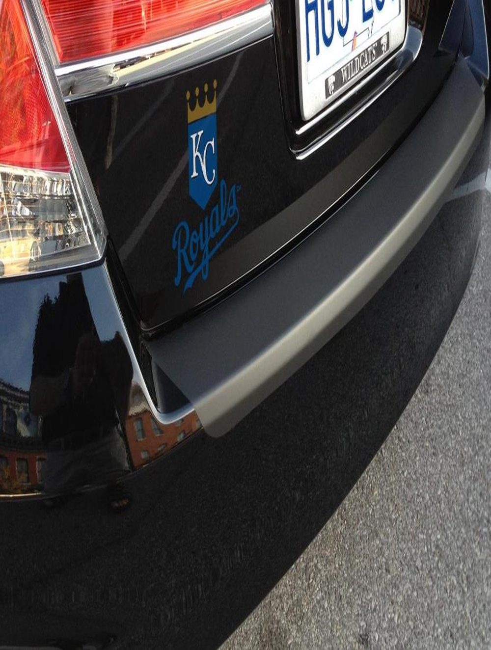 A car bumper covered in Kansas City Royals decals, from the shoot